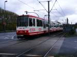 Ein dreiteiliger Stadtbahnwagen B der Dortmunder Stadwerke hat vom Hafen kommend gerade den kurzen Tunnel verlassen um als Zug der Linie U47 nach Westerfilde in die Haltestelle Insterburger Strae einzufahren - 03.04.2008.