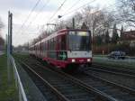 Eine Doppeltraktion aus Stadtbahnwagen B der Dsseldorfer Rheinbahn passiert am Freiligrathplatz als Zug der Linie U 79 die Abzweigungen zur Messestrecke um zum Dsseldorfer Hauptbahnhof und nach