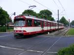 Eine Doppeltraktion aus DUEWAG-Stadtbahnwagen GT8SU auf der Hansaallee in Dsseldorf als Zug der Linie U74 nach Lrick am 30.